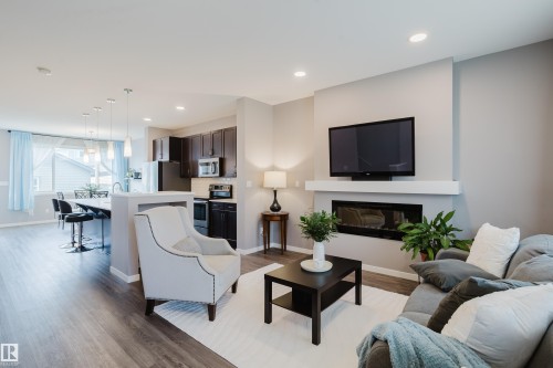 4331 Cooke Lane Sw, Edmonton, AB - Indoor Photo Showing Living Room With Fireplace