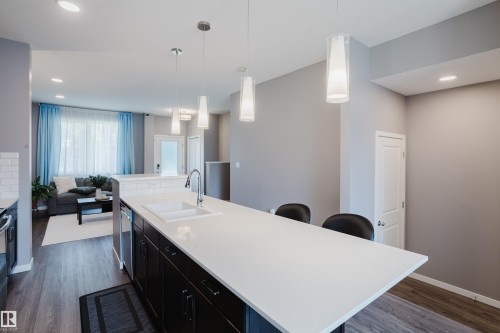 4331 Cooke Lane Sw, Edmonton, AB - Indoor Photo Showing Kitchen With Double Sink