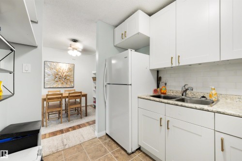 #10 2816 116 St Nw, Edmonton, AB - Indoor Photo Showing Kitchen With Double Sink