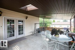 Covered patio with a patterned concrete surface - 