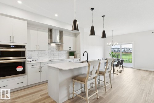 15666 18 Avenue Sw, Edmonton, AB - Indoor Photo Showing Kitchen With Upgraded Kitchen