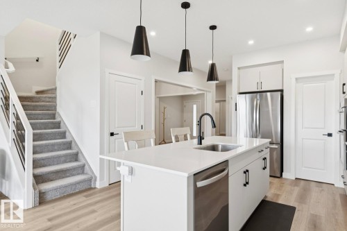 15666 18 Avenue Sw, Edmonton, AB - Indoor Photo Showing Kitchen With Upgraded Kitchen