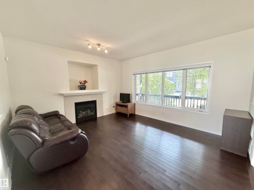 7622 Schmid Crescent Nw, Edmonton, AB - Indoor Photo Showing Living Room With Fireplace