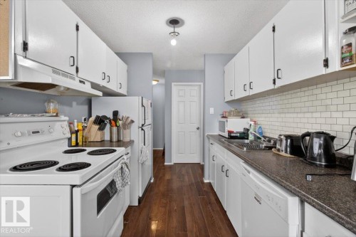 #301 10335 117 St Nw, Edmonton, AB - Indoor Photo Showing Kitchen With Double Sink