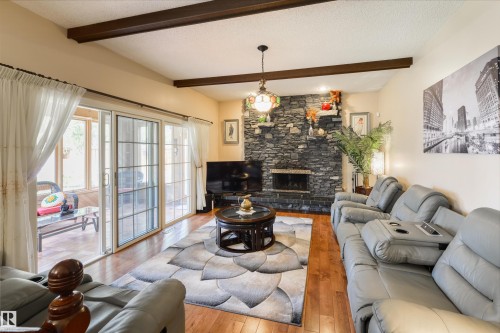 206 Wolf Willow Crescent Nw, Edmonton, AB - Indoor Photo Showing Living Room With Fireplace