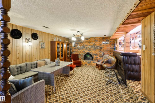 206 Wolf Willow Crescent Nw, Edmonton, AB - Indoor With Fireplace