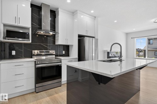 4603 36 Street, Beaumont, AB - Indoor Photo Showing Kitchen With Double Sink With Upgraded Kitchen