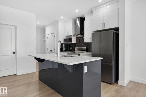 4603 36 Street, Beaumont, AB - Indoor Photo Showing Kitchen With Double Sink With Upgraded Kitchen