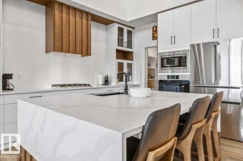 67 Meadowgrove Lane, Spruce Grove, AB - Indoor Photo Showing Kitchen With Upgraded Kitchen