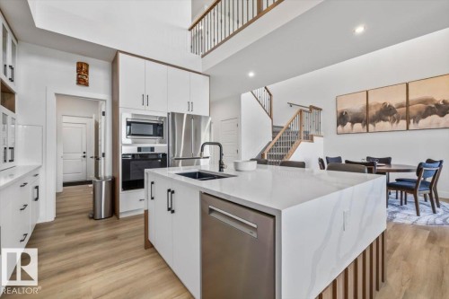 67 Meadowgrove Lane, Spruce Grove, AB - Indoor Photo Showing Kitchen With Double Sink With Upgraded Kitchen