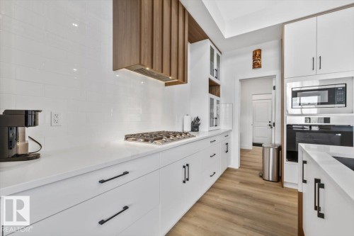 67 Meadowgrove Lane, Spruce Grove, AB - Indoor Photo Showing Kitchen With Upgraded Kitchen