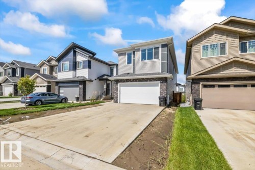 67 Meadowgrove Lane, Spruce Grove, AB - Outdoor With Facade