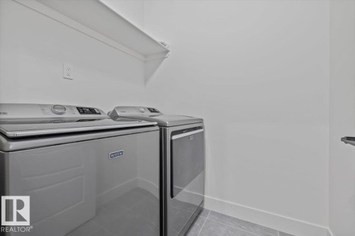 67 Meadowgrove Lane, Spruce Grove, AB - Indoor Photo Showing Laundry Room