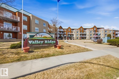 #208 9926 100 Av, Fort Saskatchewan, AB - Outdoor With Balcony With Facade