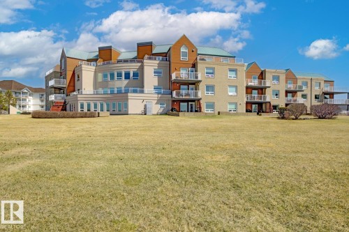 #208 9926 100 Av, Fort Saskatchewan, AB - Outdoor With Balcony With Facade