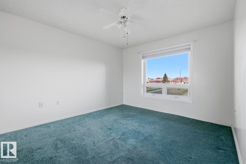 #208 9926 100 Av, Fort Saskatchewan, AB - Indoor Photo Showing Other Room