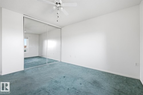 #208 9926 100 Av, Fort Saskatchewan, AB - Indoor Photo Showing Other Room