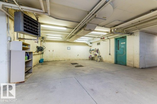 #208 9926 100 Av, Fort Saskatchewan, AB - Indoor Photo Showing Garage