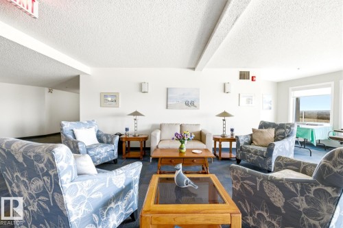 #208 9926 100 Av, Fort Saskatchewan, AB - Indoor Photo Showing Living Room