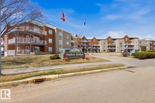 #208 9926 100 Av, Fort Saskatchewan, AB - Outdoor With Balcony With Facade