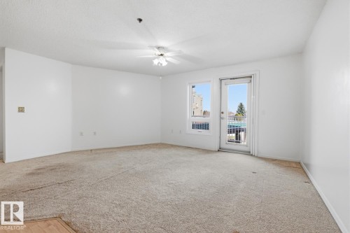 #208 9926 100 Av, Fort Saskatchewan, AB - Indoor Photo Showing Other Room