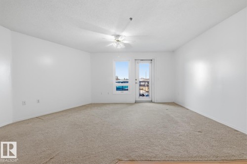 #208 9926 100 Av, Fort Saskatchewan, AB - Indoor Photo Showing Other Room