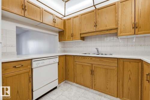#208 9926 100 Av, Fort Saskatchewan, AB - Indoor Photo Showing Kitchen With Double Sink