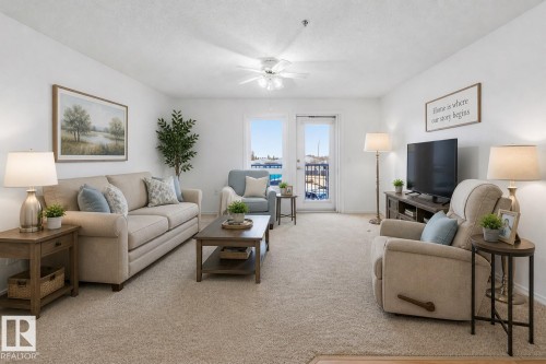 #208 9926 100 Av, Fort Saskatchewan, AB - Indoor Photo Showing Living Room