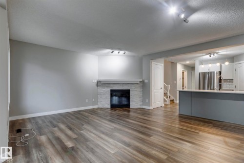 15819 69 Street Nw, Edmonton, AB - Indoor Photo Showing Living Room With Fireplace