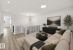 Spacious open loft area with wood-finish flooring - 