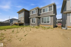 Contemporary two-story residence with horizontal siding - 