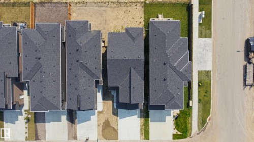 Aerial perspective showcasing multiple residential properties - 3 Pierwyck Loop, Spruce Grove, AB - 