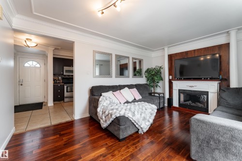 747 Clareview Road Nw, Edmonton, AB - Indoor Photo Showing Living Room With Fireplace