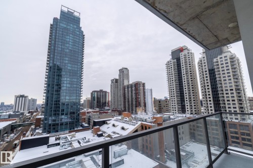 Balcony showcasing urban skyline with multiple high-rise buildings - #1201 10238 103 St Nw, Edmonton, AB - Outdoor With Balcony