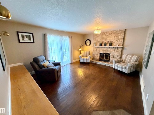 4309 53 Street, St. Paul Town, AB - Indoor Photo Showing Living Room With Fireplace