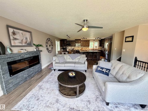 4309 53 Street, St. Paul Town, AB - Indoor Photo Showing Living Room With Fireplace