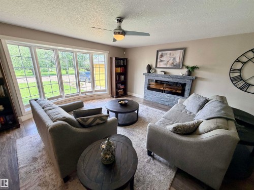 4309 53 Street, St. Paul Town, AB - Indoor Photo Showing Living Room With Fireplace
