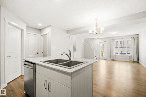 #90 50 Mclaughlin Dr, Spruce Grove, AB - Indoor Photo Showing Kitchen With Double Sink