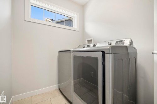#90 50 Mclaughlin Dr, Spruce Grove, AB - Indoor Photo Showing Laundry Room