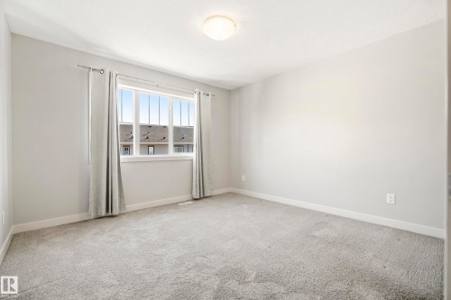 #90 50 Mclaughlin Dr, Spruce Grove, AB - Indoor Photo Showing Other Room