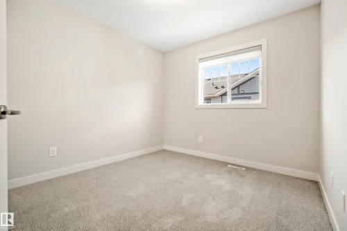 #90 50 Mclaughlin Dr, Spruce Grove, AB - Indoor Photo Showing Other Room