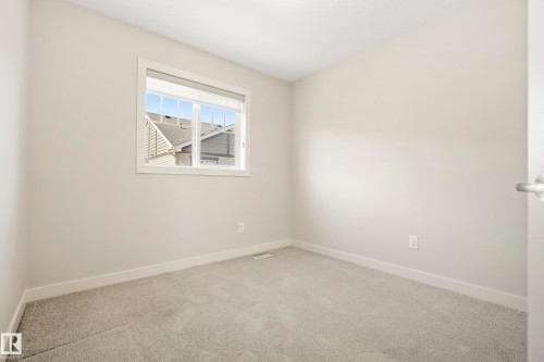 #90 50 Mclaughlin Dr, Spruce Grove, AB - Indoor Photo Showing Other Room