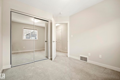 #90 50 Mclaughlin Dr, Spruce Grove, AB - Indoor Photo Showing Other Room