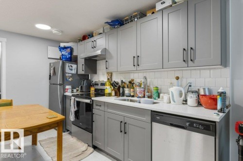 2554 151A Avenue Nw, Edmonton, AB - Indoor Photo Showing Kitchen With Double Sink