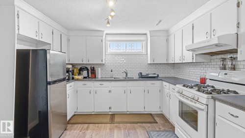 7819 132A Avenue Nw, Edmonton, AB - Indoor Photo Showing Kitchen With Double Sink