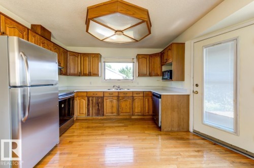 3908 28 Avenue Nw, Edmonton, AB - Indoor Photo Showing Kitchen With Double Sink