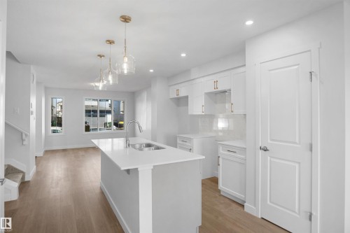 94 Juniper Wynd, Fort Saskatchewan, AB - Indoor Photo Showing Kitchen With Upgraded Kitchen