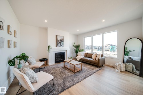 54 Clichy Close, St. Albert, AB - Indoor Photo Showing Living Room With Fireplace