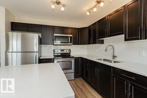 #32 445 Brintnell Bv Nw, Edmonton, AB - Indoor Photo Showing Kitchen With Stainless Steel Kitchen With Double Sink