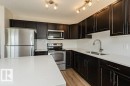 #32 445 Brintnell Bv Nw, Edmonton, AB  - Indoor Photo Showing Kitchen With Stainless Steel Kitchen With Double Sink 